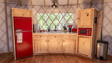 Fridge, coffee/tea maker, cookware/dishes/utensils