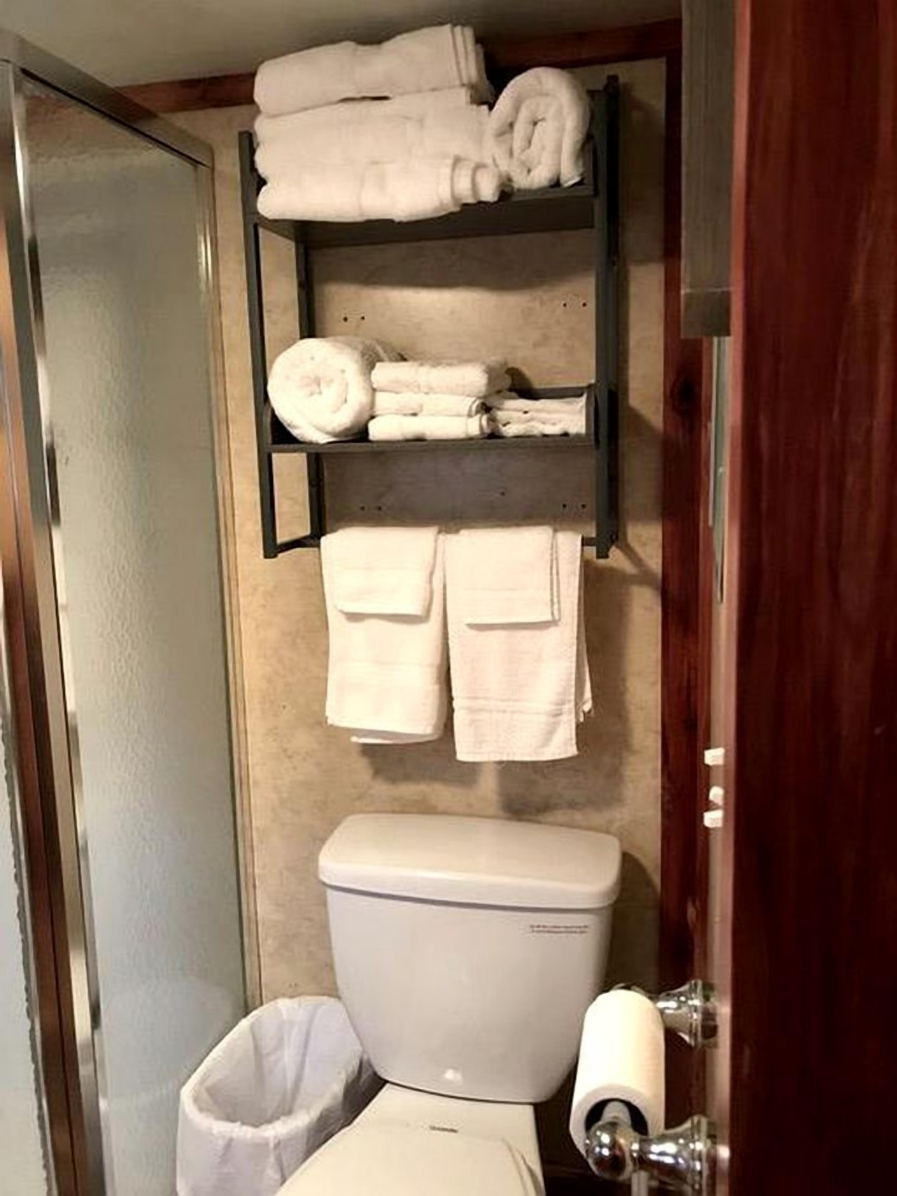 Hair dryer, towels, soap, shampoo