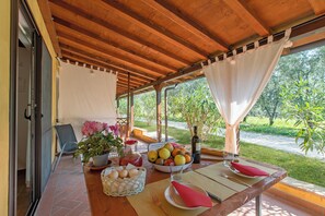 Family Apartment, Multiple Bedrooms, Mountainside (Vigna Apartment Relax Near The Sea) | Outdoor dining - Agriturismo Il Nazareno Apartments (Cecina)