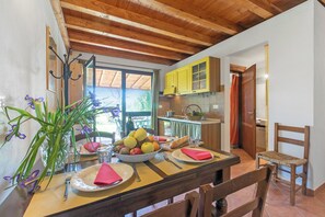 Family Apartment, Multiple Bedrooms, Mountainside (Eucalipto Apartment Relax Near The) | Dining room - Agriturismo Il Nazareno Apartments (Cecina)