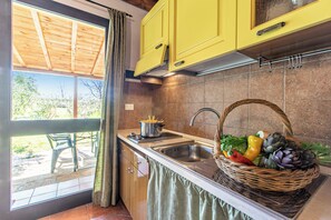 Family Apartment, Multiple Bedrooms, Mountainside (Eucalipto Apartment Relax Near The) | Private kitchenette | Fridge, oven, stovetop, coffee/tea maker - Agriturismo Il Nazareno Apartments (Cecina)