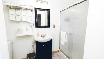 Hair dryer, towels, soap, shampoo