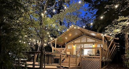 North Carolina Escape in this Fully-Equipped Safari Tent with Lake Access, Hot-Tub and Fire Pit