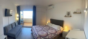 1 dormitorio, tabla de planchar con plancha, Internet y ropa de cama