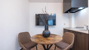 Apartment, Balcony, City View | Dining