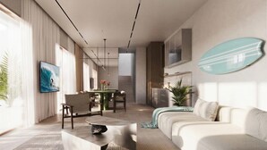 A modern living room with a sofa, a coffee table, and a dining area with a table and chairs. - Surfside Appartments & Villas (Pecatu)