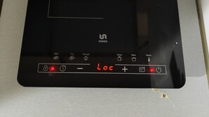 A black induction cooktop with a digital display and control buttons. - The Best offer! 2-bedroom apartment in Vracar with AC for relaxing stays (Beograd)