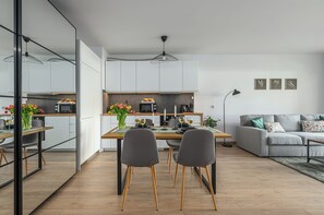 Comfort Apartment, Patio, Courtyard View | Private kitchen | Espresso maker, electric kettle, toaster, griddle - Lumina apartment with patio and parking (Łódź)