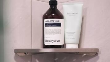 Shower, towels, soap, toilet paper