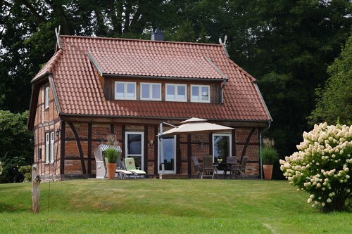 Unique half-timbered house on a park-like plot with fantastic views