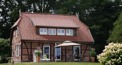 Unique half-timbered house on a park-like plot with fantastic views
