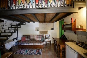 Estúdio, vista para o jardim | Área de estar