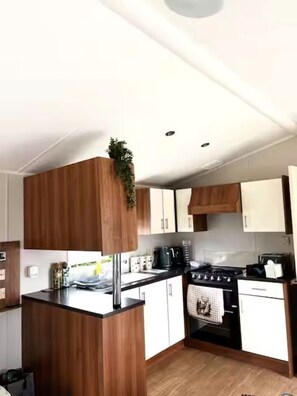 Private kitchen - Peaceful 8-Berth Caravan Retreat | Pet Friendly (Stanford Bishop)