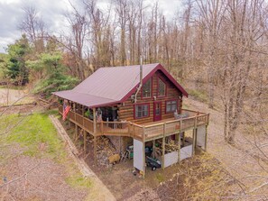 Exterior - Peaceful log cabin retreat with wraparound deck, open living space, full kitchen, cozy bedrooms & scenic wooded views. (Floyd)