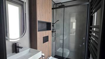 Shower, hair dryer, towels, soap