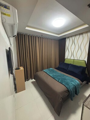1 bedroom, WiFi - Cozy 1-bedroom condo in perfect Manila with AC pool and fitness (Manila)