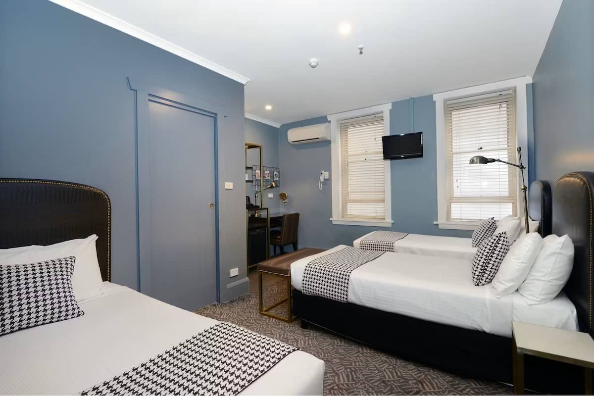 Quarto triplo executivo