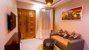 Standard Double Room, Balcony | Living area