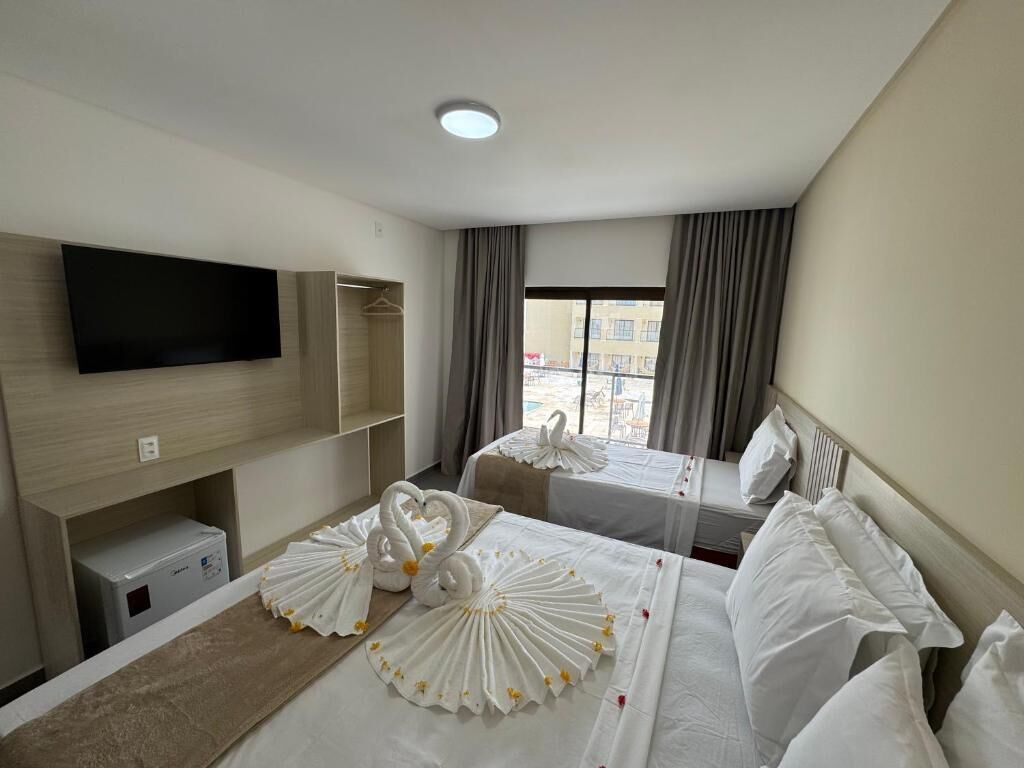 Kolmen hengen deluxe-huone, osittainen merinäköala