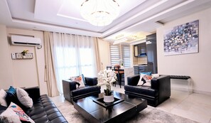 Ático de lujo, vistas a la ciudad | Zona de estar