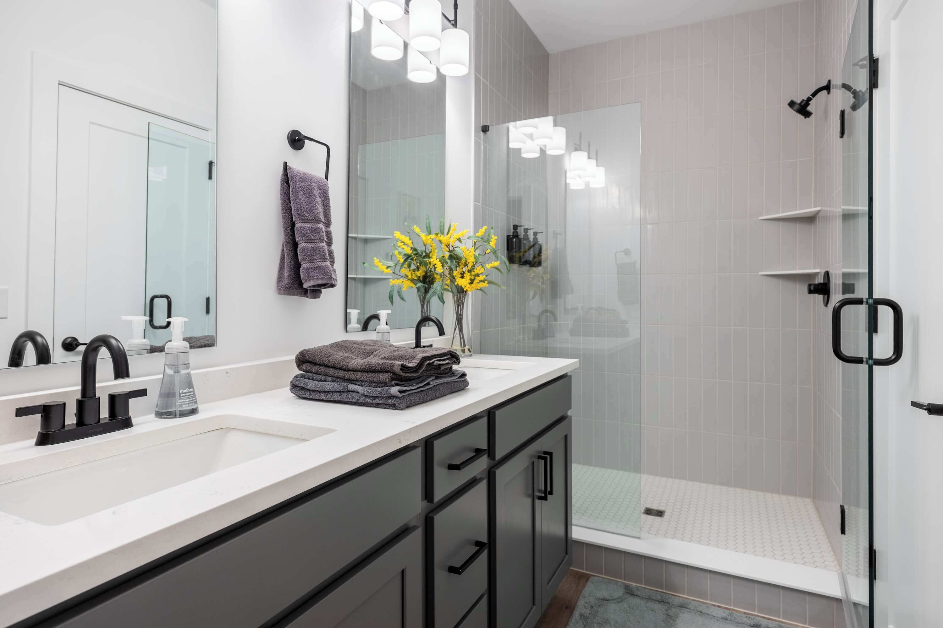 Shower, hair dryer, towels, shampoo