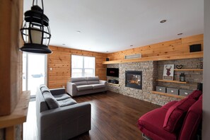 Unclassified image, 3 of 50, button - L'Exode au Ruisseau | 4season Spa | Lake | PoolTable | AC |In/Out Fireplace| BBQ (Saint-Adolphe-d'Howard)