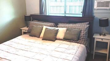 Tabla de planchar con plancha, wifi, ropa de cama