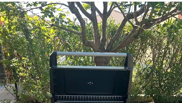 A portable camping grill with a control panel, a side shelf, and a vented lid. - Mini Villa "Mon Rêve Corse" Seaside in Residence with Swimming Pool (Cervione)