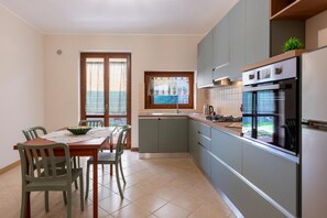 Fridge - A cozy and spacious 110 square meters apartment, perfect for three people, located on the ground floor of a modern building.The property is located in Nicolosi, a town in the province of Catania located on the southern slopes of Mount Etna, making it an  (Nicolosi)
