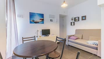 Appartement, meerdere bedden, privébadkamer | Woonruimte