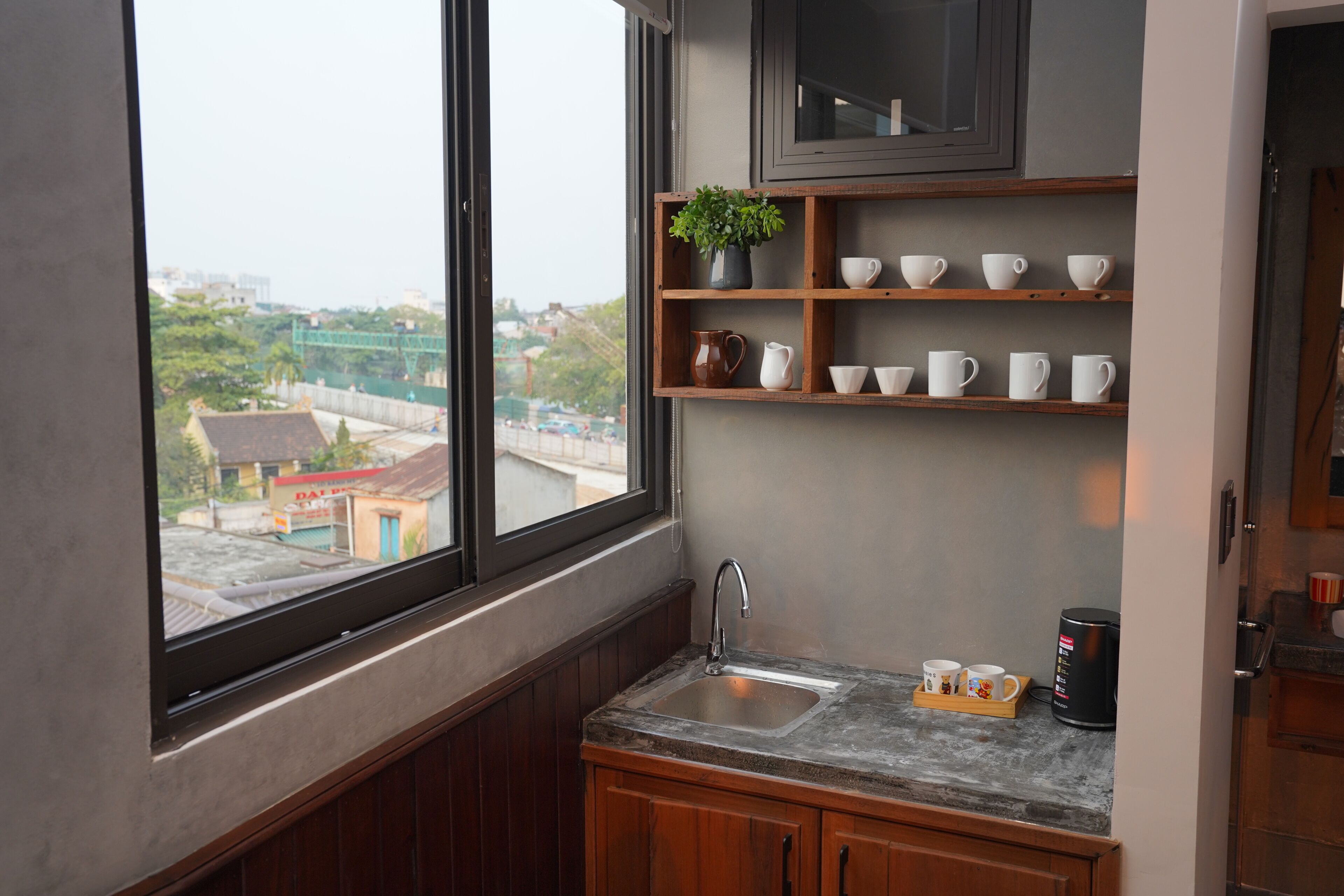 Suite monolocale, 1 letto king, vista giardino | Cucina privata