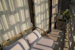 Habitación cuádruple estándar, vistas al jardín | Jardines del alojamiento