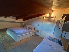 1 chambre, fer et planche à repasser, draps fournis