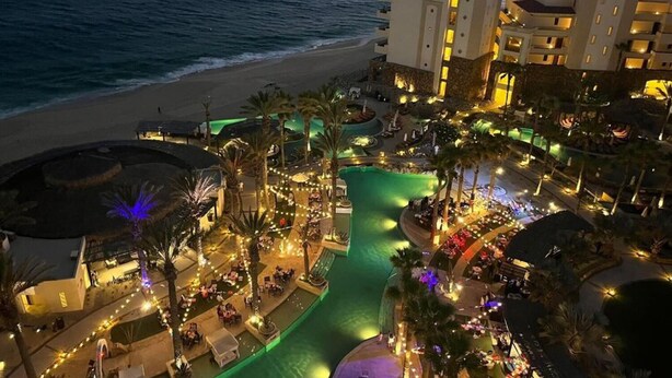 A resort with a pool, palm trees, and a beach view. - Spacious 2 BR, 3 bath Presidential Suite. Pacific Ocean View. 6 guests welcome! (Cabo San Lucas)