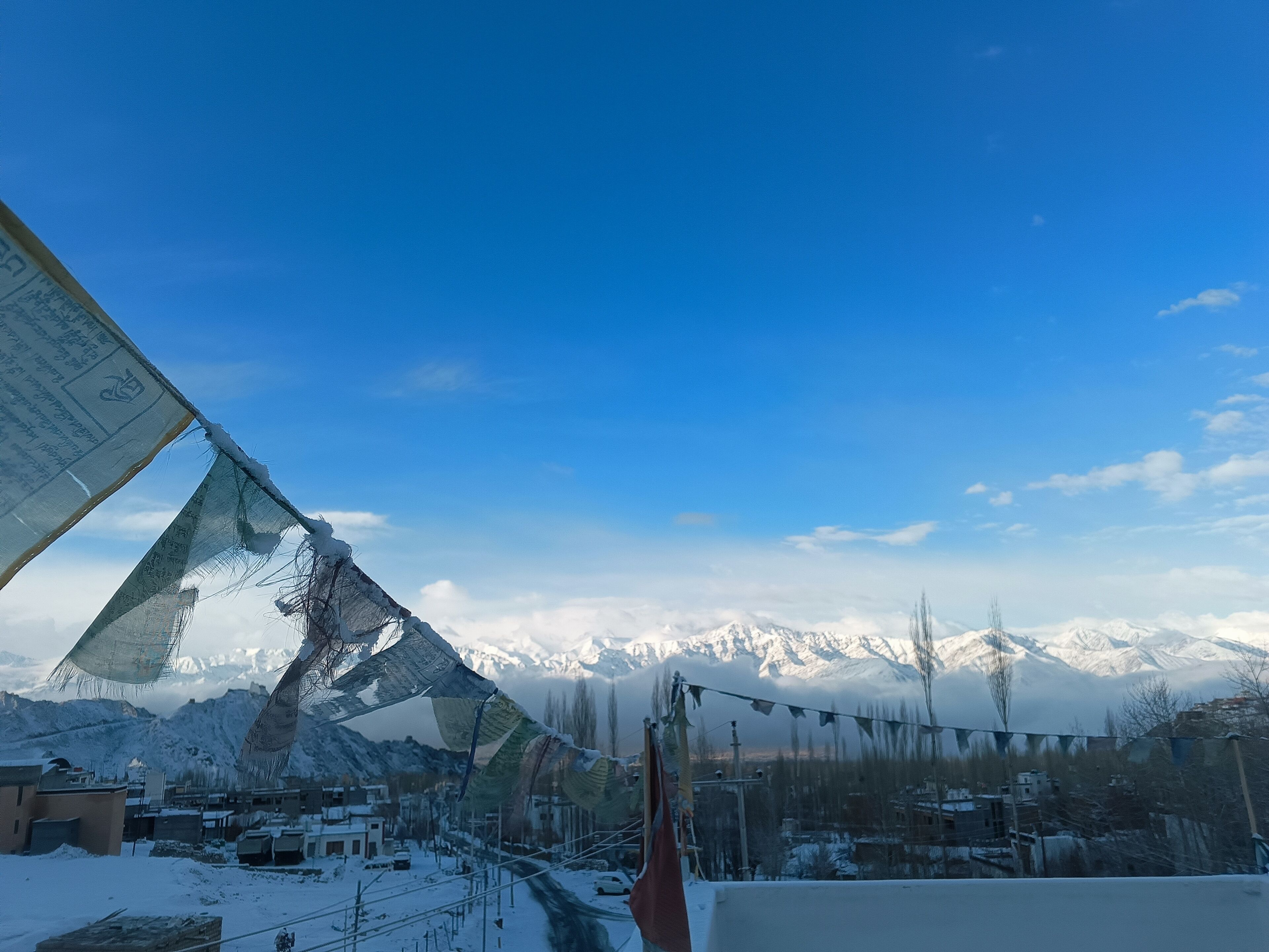 A snowy mountain landscape with a clear sky.