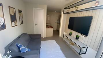 Apartamento | Área de estar | TV de tela plana