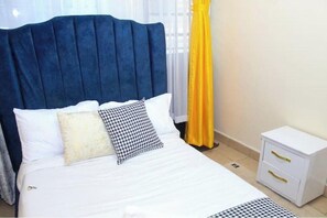 1 bedroom, WiFi - Cijana Gardens: Cozy Elegance Steps from Sarit Centre (Nairobi)