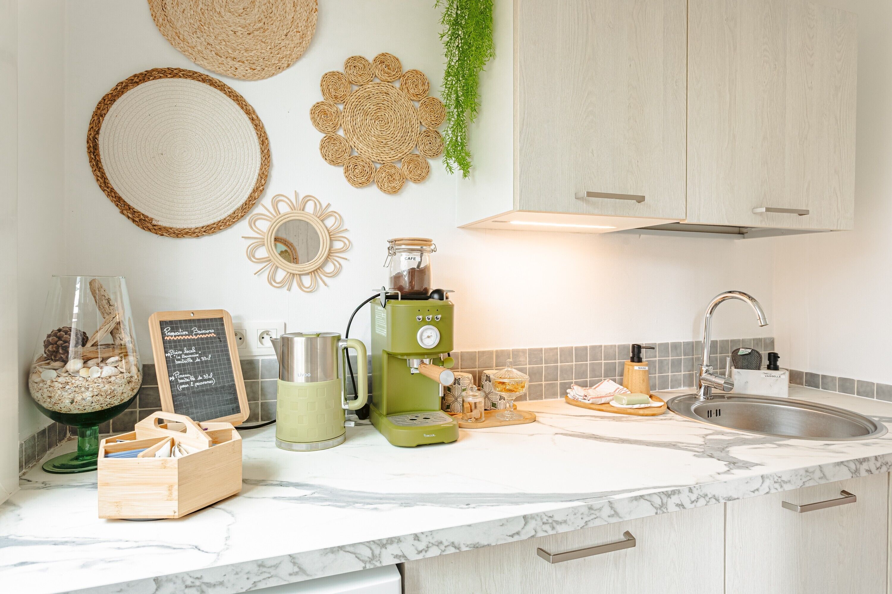Fridge, coffee/tea maker, electric kettle, cookware/dishes/utensils