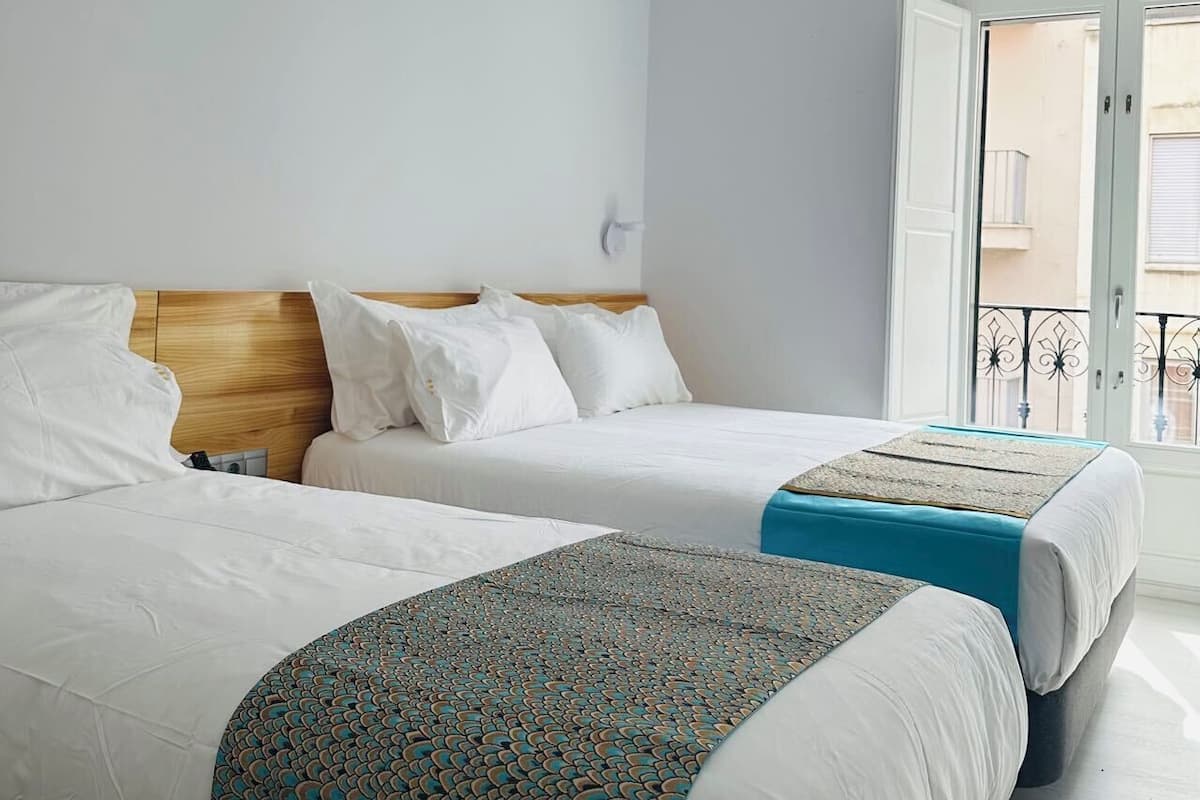 Kolmen hengen deluxe-huone