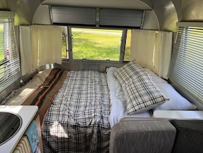 1 bedroom, bed sheets - Cozy 1-bedroom Bambi Airstream camper on a 56 acre farm with stream and woods. (Morris)