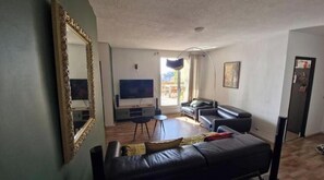 Living area - 2-bedroom family apartment with large terrace and sea view (Bastia)