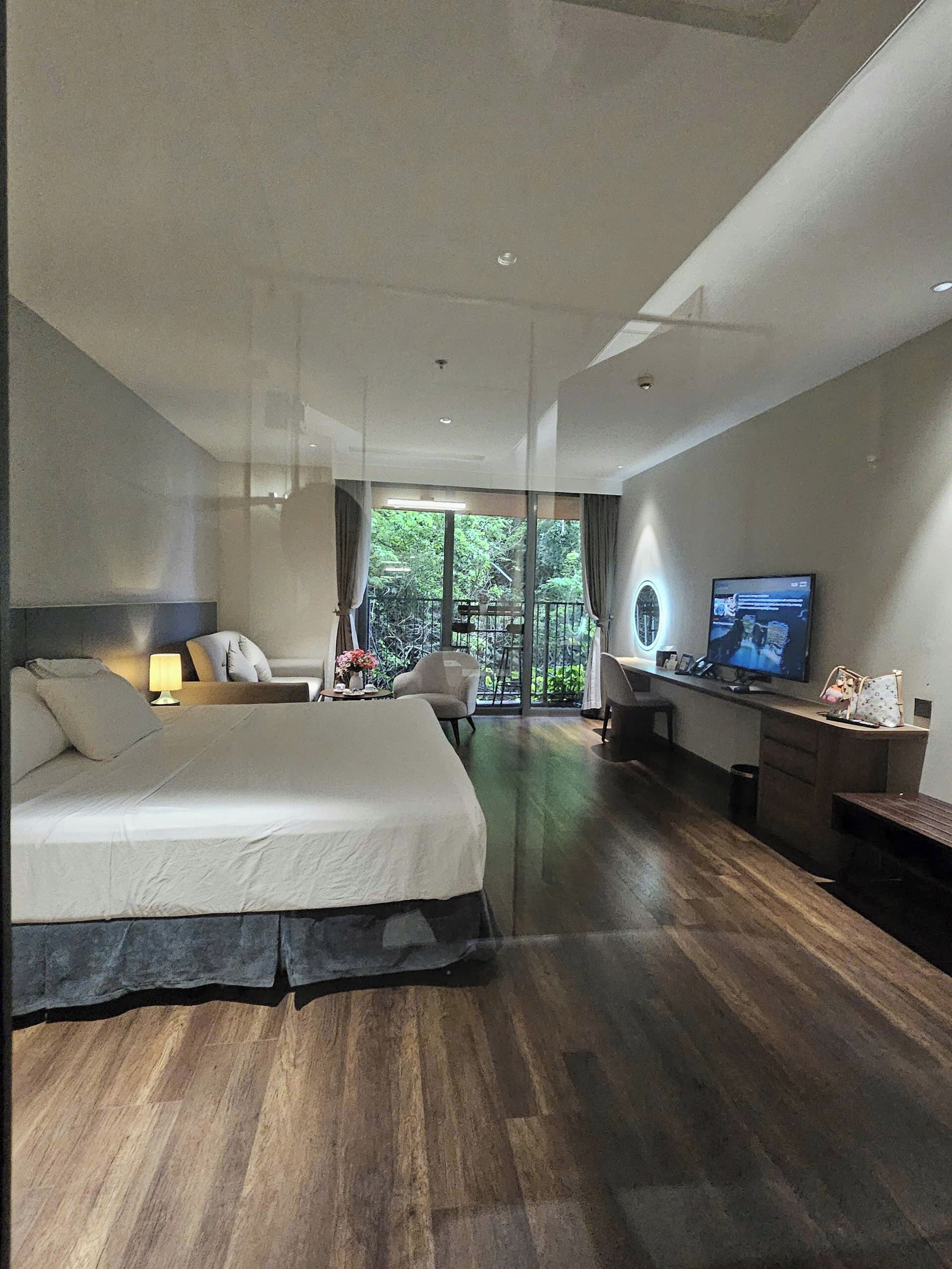 Deluxe Room, Balcony, Mountain View | In-room safe, desk, laptop workspace, iron/ironing board