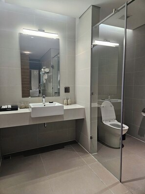 Premium Double Room, Balcony, Beach View | Bathroom | Combined shower/tub, hair dryer, slippers, towels - Flamingo Cat Ba Condotel-H2303 (Cat Hai)