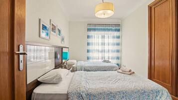 3 slaapkamers, een strijkplank/strijkijzer, wifi, beddengoed