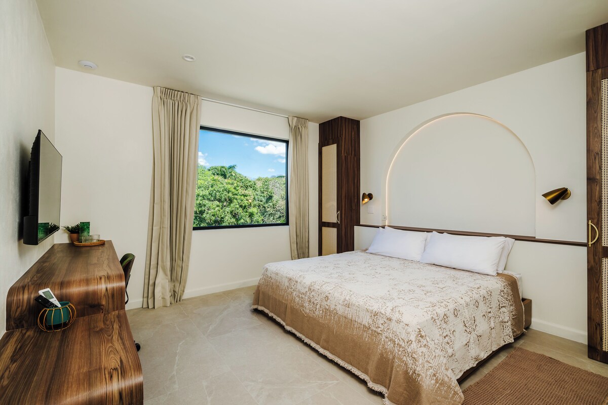 Habitación estándar, vista parcial al mar, junto a la alberca | Caja de seguridad en la habitación, wifi gratis y ropa de cama 