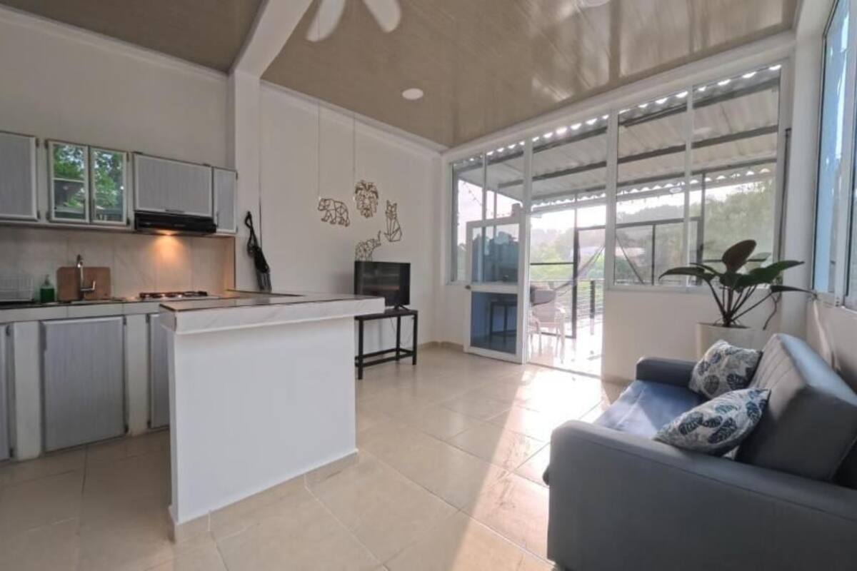 Chambre Deluxe, balcon, vue cour intérieure | Coin séjour