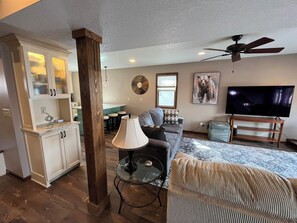 Smart TV, fireplace, books