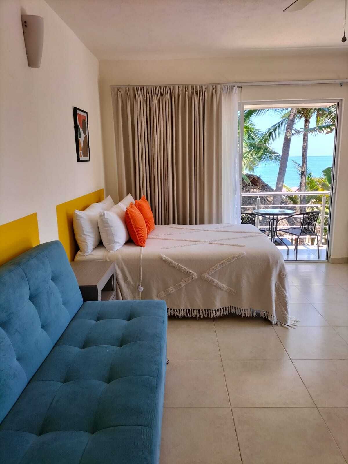 Standaard vierpersoonskamer, balkon, uitzicht op oceaan