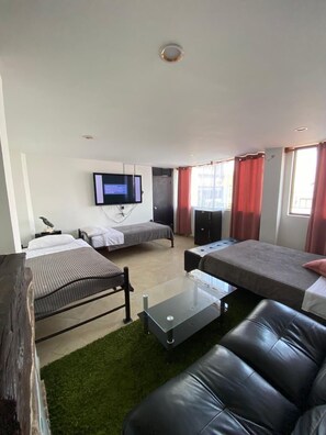 Quarto quádruplo família, vista para a cidade