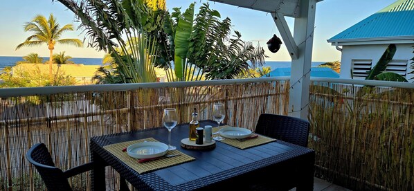 Outdoor dining - Incredible sea view apartment 🌊 - Swimming pool - Terrace - (Saint-Martin)